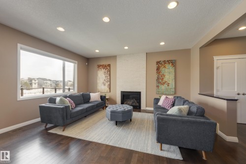 3825 Agar Green, Edmonton, AB - Indoor Photo Showing Living Room With Fireplace