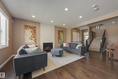 3825 Agar Green, Edmonton, AB - Indoor Photo Showing Other Room With Fireplace