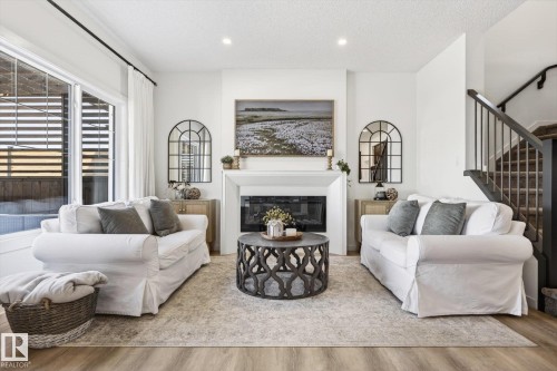 67 Prospect Place, Spruce Grove, AB - Indoor Photo Showing Living Room With Fireplace