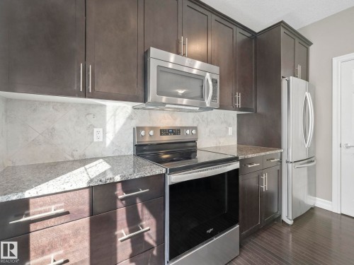 81 2003 Rabbit Hill Road Nw, Edmonton, AB - Indoor Photo Showing Kitchen With Stainless Steel Kitchen With Upgraded Kitchen