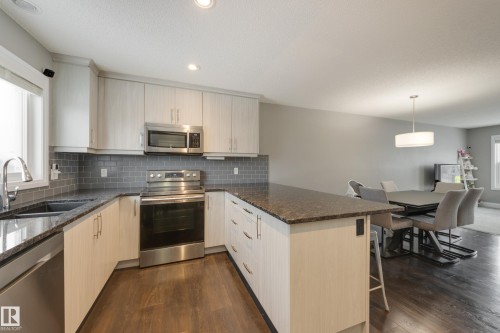 232 Southfork Drive, Leduc, AB - Indoor Photo Showing Kitchen With Double Sink With Upgraded Kitchen