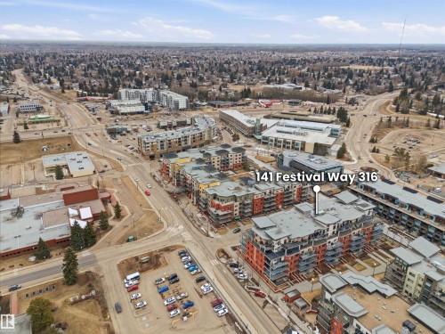 Aerial view of the property and its surrounding urban landscape, featuring established infrastructure and nearby buildings - 316 141 Festival Way, Sherwood Park, AB - Outdoor With View