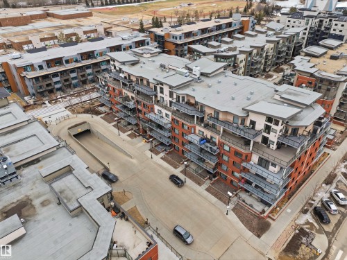 This property features a multi-story building with a flat roof and numerous balconies - 316 141 Festival Way, Sherwood Park, AB - 