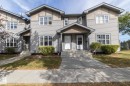 The property features siding and decorative shingles on the facade, with a concrete pathway leading to the entrance - 197 Birchwood Close, Devon, AB  - Outdoor With Facade 