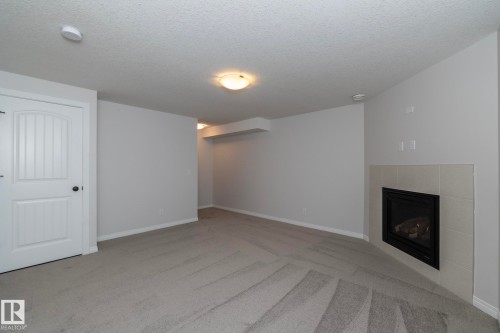 197 Birchwood Close, Devon, AB - Indoor With Fireplace