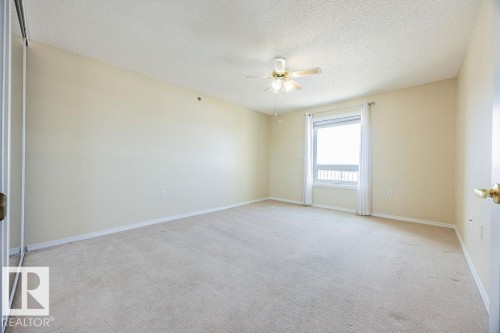 #305 9926 100 Av, Fort Saskatchewan, AB - Indoor Photo Showing Other Room