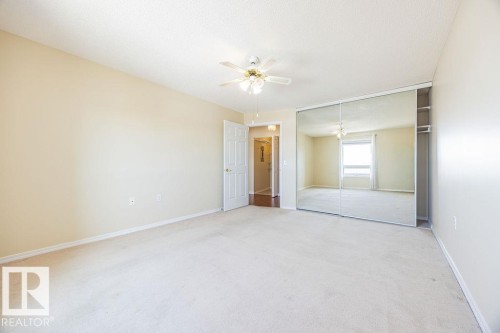 #305 9926 100 Av, Fort Saskatchewan, AB - Indoor Photo Showing Other Room