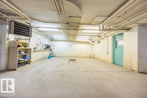 #305 9926 100 Av, Fort Saskatchewan, AB - Indoor Photo Showing Garage