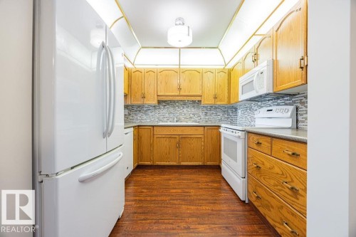 #305 9926 100 Av, Fort Saskatchewan, AB - Indoor Photo Showing Kitchen