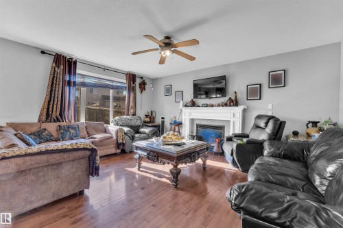 7939 2 Avenue, Edmonton, AB - Indoor Photo Showing Living Room With Fireplace
