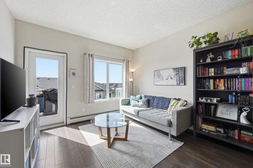 421 1820 Rutherford Road, Edmonton, AB - Indoor Photo Showing Living Room