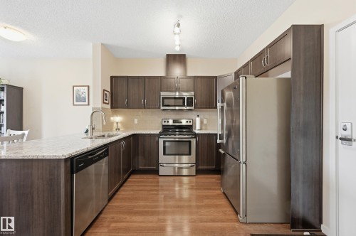 421 1820 Rutherford Road, Edmonton, AB - Indoor Photo Showing Kitchen With Stainless Steel Kitchen With Upgraded Kitchen