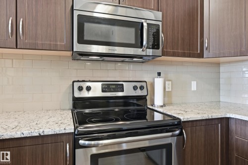421 1820 Rutherford Road, Edmonton, AB - Indoor Photo Showing Kitchen With Upgraded Kitchen