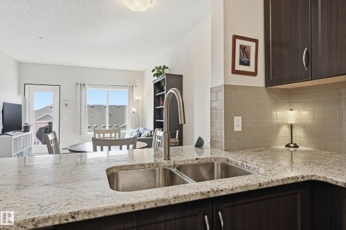 421 1820 Rutherford Road, Edmonton, AB - Indoor Photo Showing Kitchen With Double Sink
