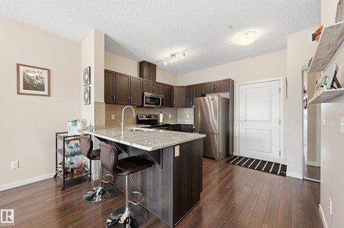 421 1820 Rutherford Road, Edmonton, AB - Indoor Photo Showing Kitchen With Stainless Steel Kitchen