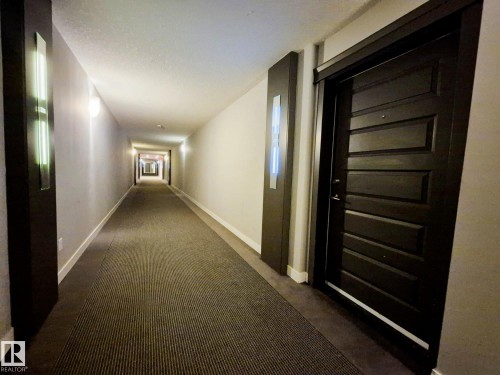 229 5151 Windermere Boulevard, Edmonton, AB - Indoor Photo Showing Other Room