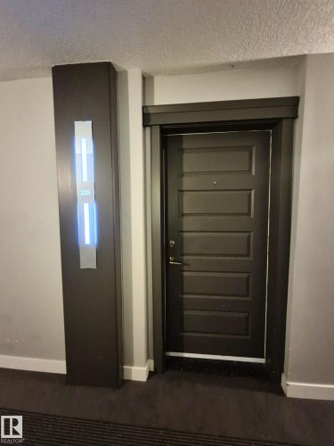 229 5151 Windermere Boulevard, Edmonton, AB - Indoor Photo Showing Other Room