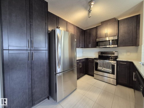 229 5151 Windermere Boulevard, Edmonton, AB - Indoor Photo Showing Kitchen