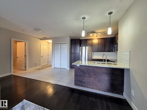 229 5151 Windermere Boulevard, Edmonton, AB - Indoor Photo Showing Kitchen With Double Sink