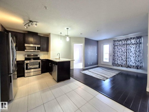229 5151 Windermere Boulevard, Edmonton, AB - Indoor Photo Showing Kitchen With Upgraded Kitchen