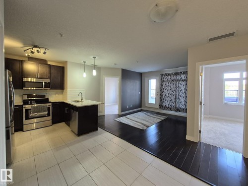 229 5151 Windermere Boulevard, Edmonton, AB - Indoor Photo Showing Kitchen