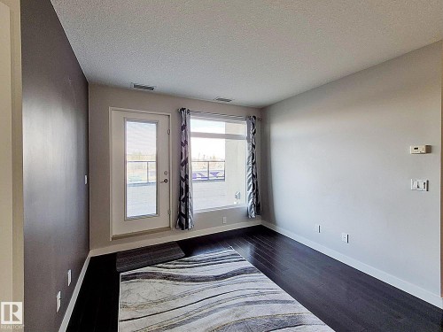 229 5151 Windermere Boulevard, Edmonton, AB - Indoor Photo Showing Other Room