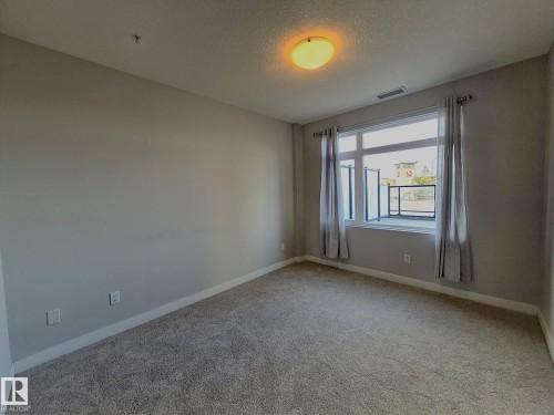 229 5151 Windermere Boulevard, Edmonton, AB - Indoor Photo Showing Other Room