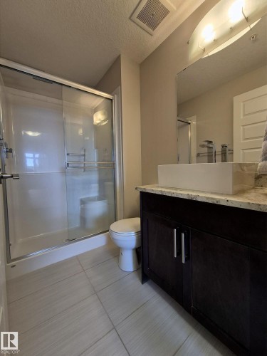 229 5151 Windermere Boulevard, Edmonton, AB - Indoor Photo Showing Bathroom
