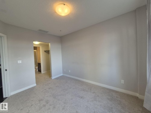 229 5151 Windermere Boulevard, Edmonton, AB - Indoor Photo Showing Other Room