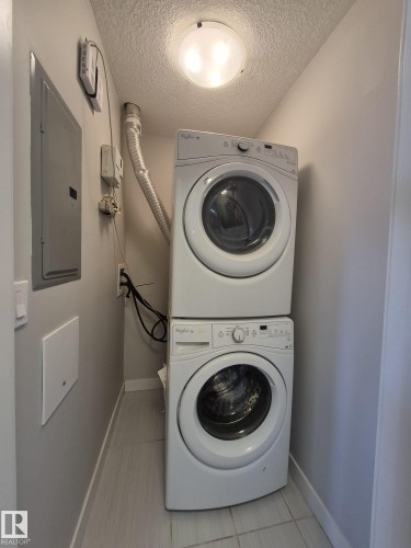 229 5151 Windermere Boulevard, Edmonton, AB - Indoor Photo Showing Laundry Room