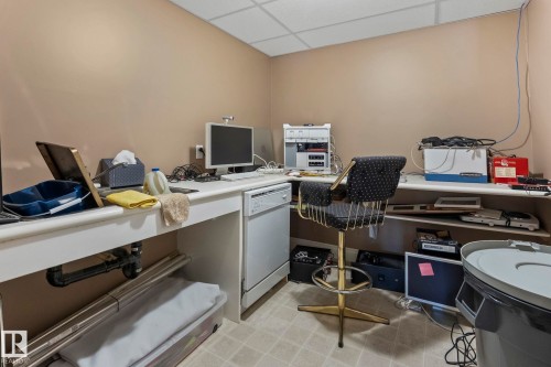 This room features light brown walls and a white dropped ceiling - 9610 167 Street Sw, Edmonton, AB - Indoor Photo Showing Office