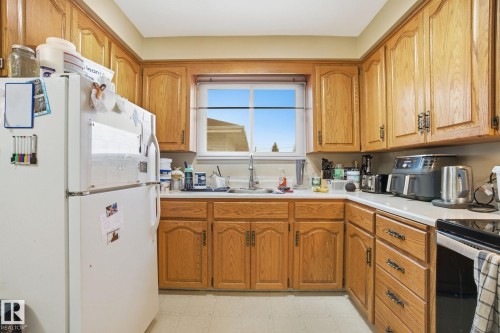 8208 73 Avenue, Edmonton, AB - Indoor Photo Showing Kitchen With Double Sink