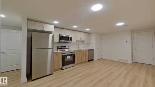 Edmonton, AB - Indoor Photo Showing Kitchen With Stainless Steel Kitchen