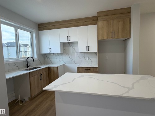 271 Munn Way, Leduc, AB - Indoor Photo Showing Kitchen With Double Sink