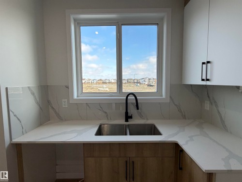 271 Munn Way, Leduc, AB - Indoor Photo Showing Kitchen With Double Sink