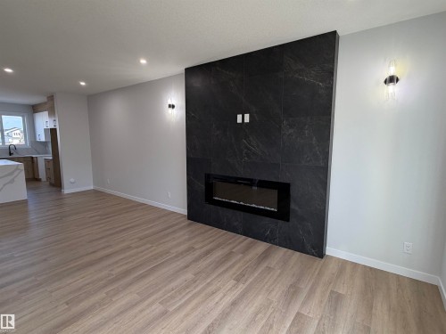 271 Munn Way, Leduc, AB - Indoor Photo Showing Living Room With Fireplace