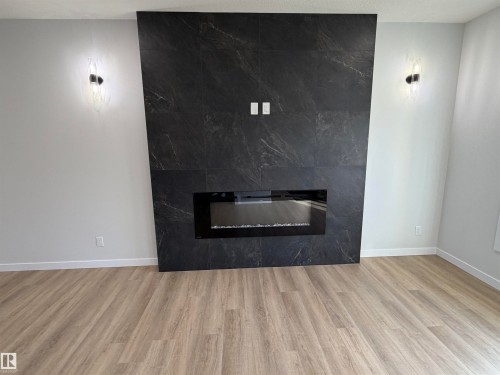 271 Munn Way, Leduc, AB - Indoor Photo Showing Living Room With Fireplace