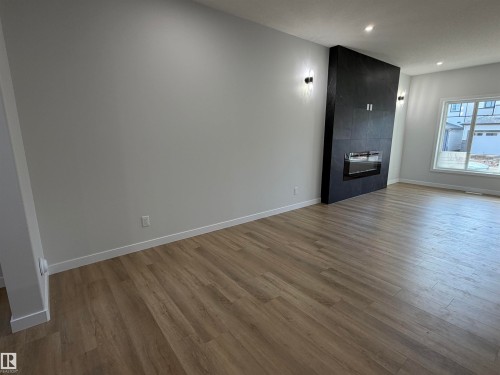 271 Munn Way, Leduc, AB - Indoor Photo Showing Other Room With Fireplace