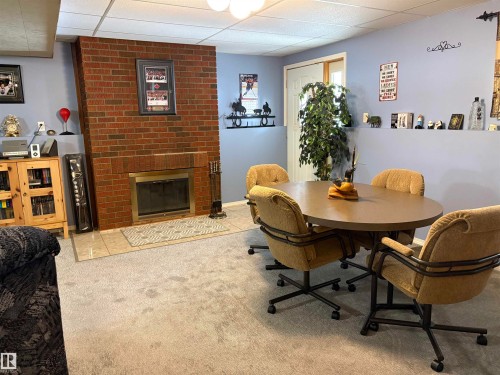 5306 52 Street, Elk Point, AB - Indoor With Fireplace