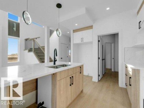 8512 Mayday Run Run, Edmonton, AB - Indoor Photo Showing Kitchen With Double Sink