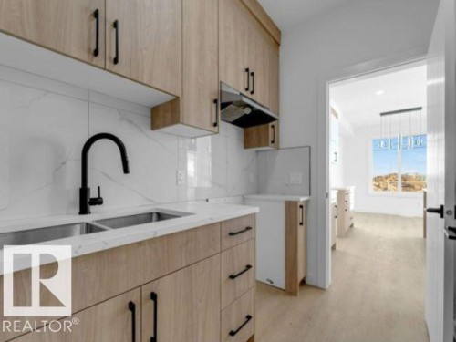 8512 Mayday Run Run, Edmonton, AB - Indoor Photo Showing Kitchen With Double Sink With Upgraded Kitchen