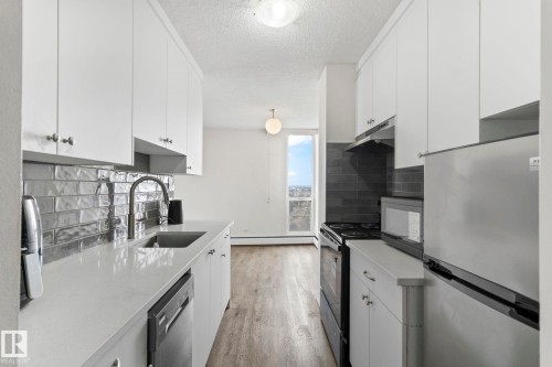 1003 10883 Saskatchewan Drive, Edmonton, AB - Indoor Photo Showing Kitchen With Upgraded Kitchen
