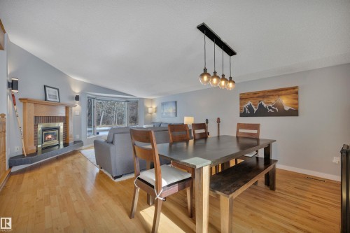 4224 Aspen Drive E, Edmonton, AB - Indoor Photo Showing Dining Room With Fireplace