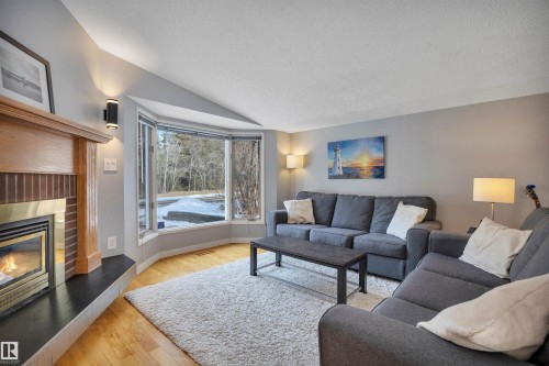4224 Aspen Drive E, Edmonton, AB - Indoor Photo Showing Living Room With Fireplace