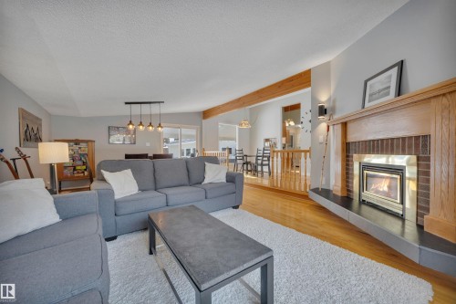 4224 Aspen Drive E, Edmonton, AB - Indoor Photo Showing Living Room With Fireplace