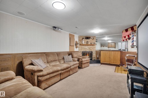 4224 Aspen Drive E, Edmonton, AB - Indoor Photo Showing Living Room With Fireplace