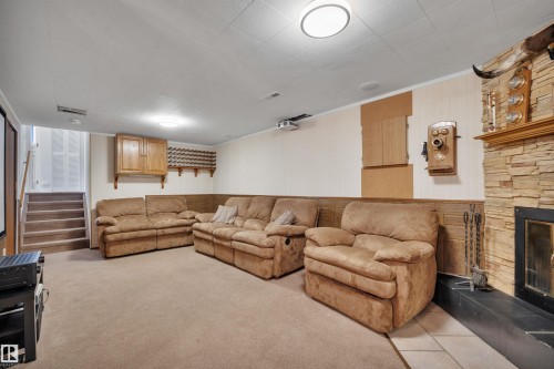 4224 Aspen Drive E, Edmonton, AB - Indoor Photo Showing Living Room With Fireplace