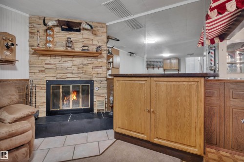 4224 Aspen Drive E, Edmonton, AB - Indoor Photo Showing Living Room With Fireplace