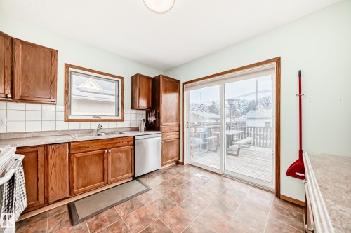 12015 104 Street, Edmonton, AB - Indoor Photo Showing Kitchen With Double Sink