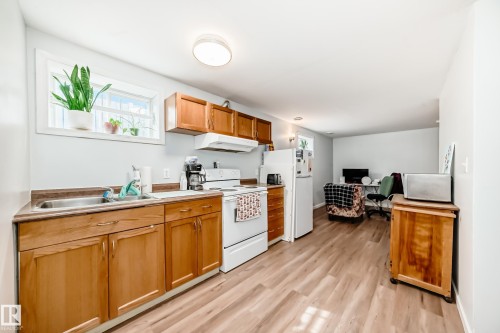 12015 104 Street, Edmonton, AB - Indoor Photo Showing Kitchen With Double Sink